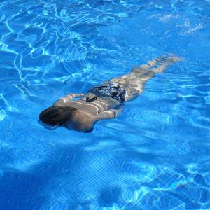 Swimmer in Clean Pool